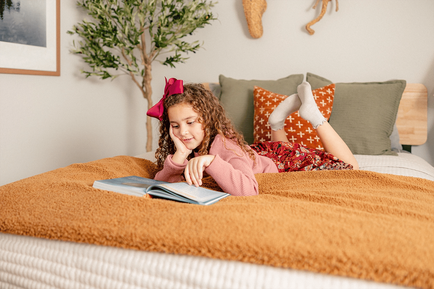 Girl reading in bed