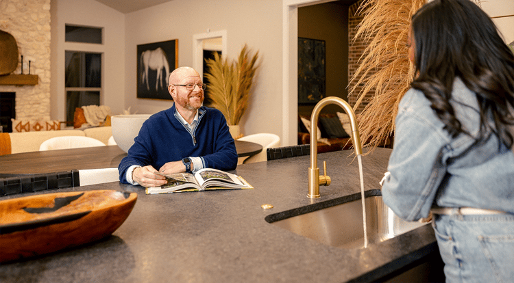 Couple hanging out in their kitchen