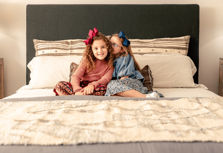 Sisters laughing with each other