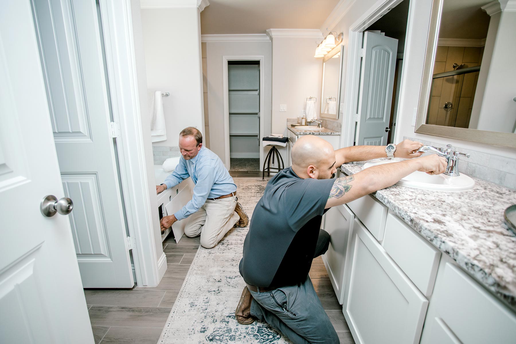 Photo of Betenbough Homes warranty team members working on a home.