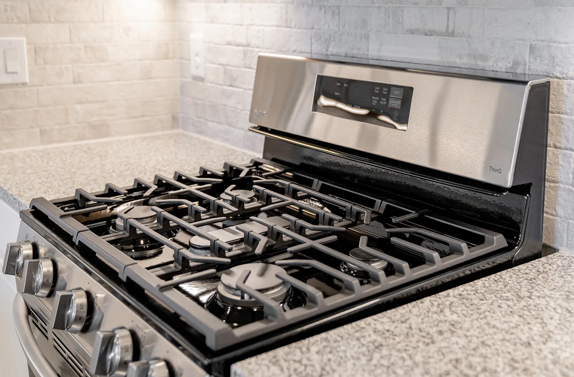 Photo of a gas range in a Betenbough home.