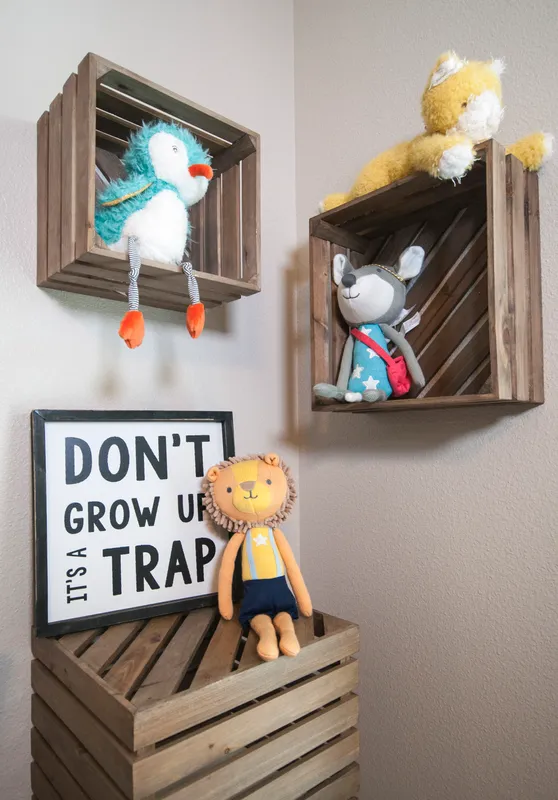 Photo of wooden crates used as both shelving and storage in a playroom.