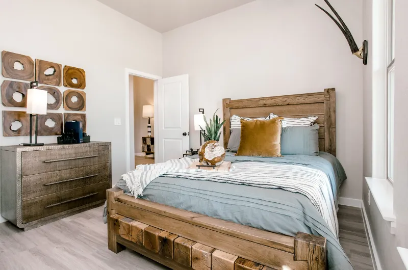 Photo of a furnished, decorated bedroom in a beautiful West Texas Betenbough Home.