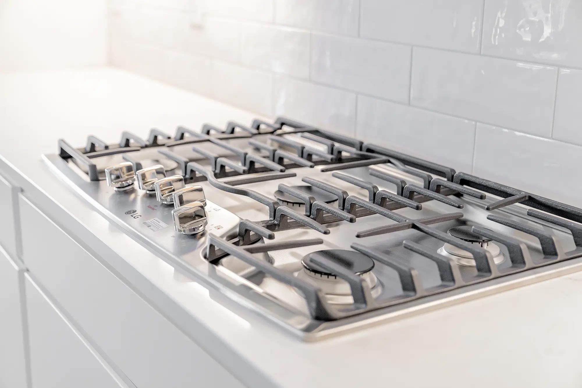 Photo of a gas cooktop in a Betenbough home.