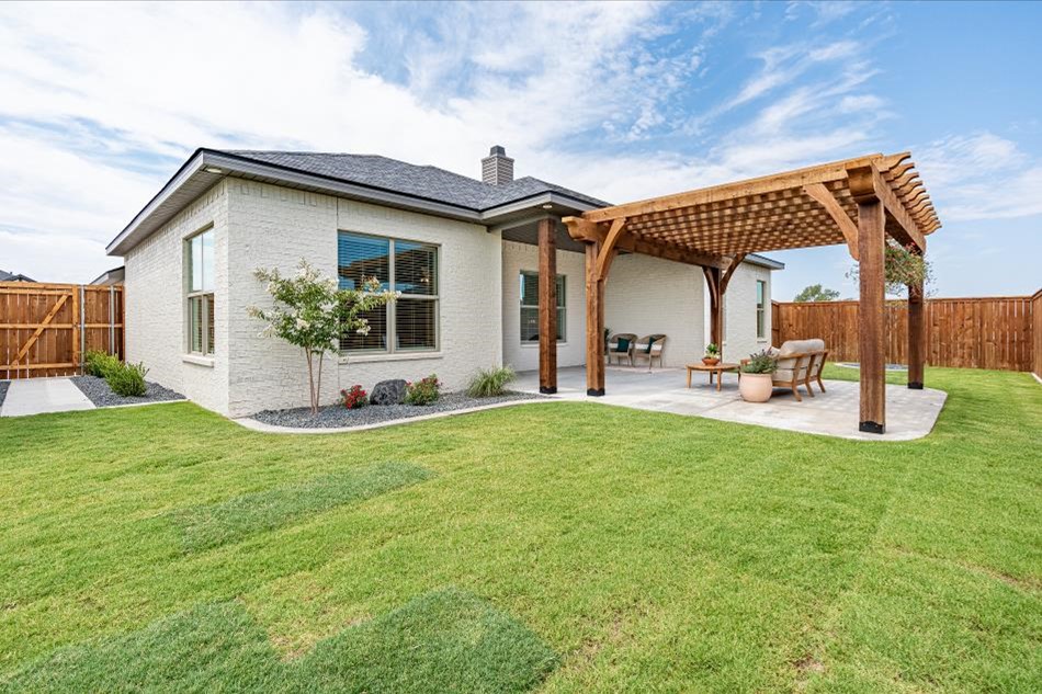 Photo of Betenbough Homes' 2024 Lubbock Parade Home landscaped backyard.