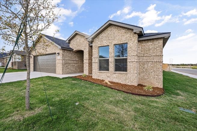 Photo of a Betenbough Home with a Bermuda grass front yard.