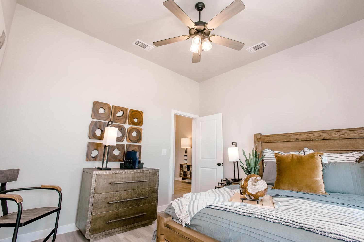 Photo of a furnished, decorated bedroom in a Betenbough home.