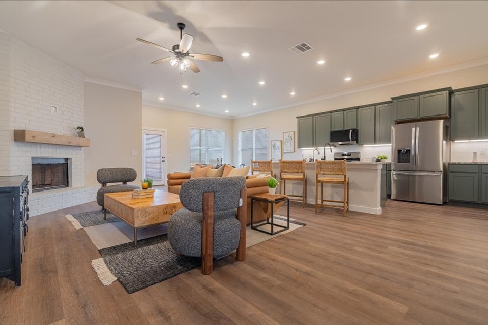 Photo of the staged living room and kitchen in the Betenbough Homes' 2025 Amarillo Parade Home.
