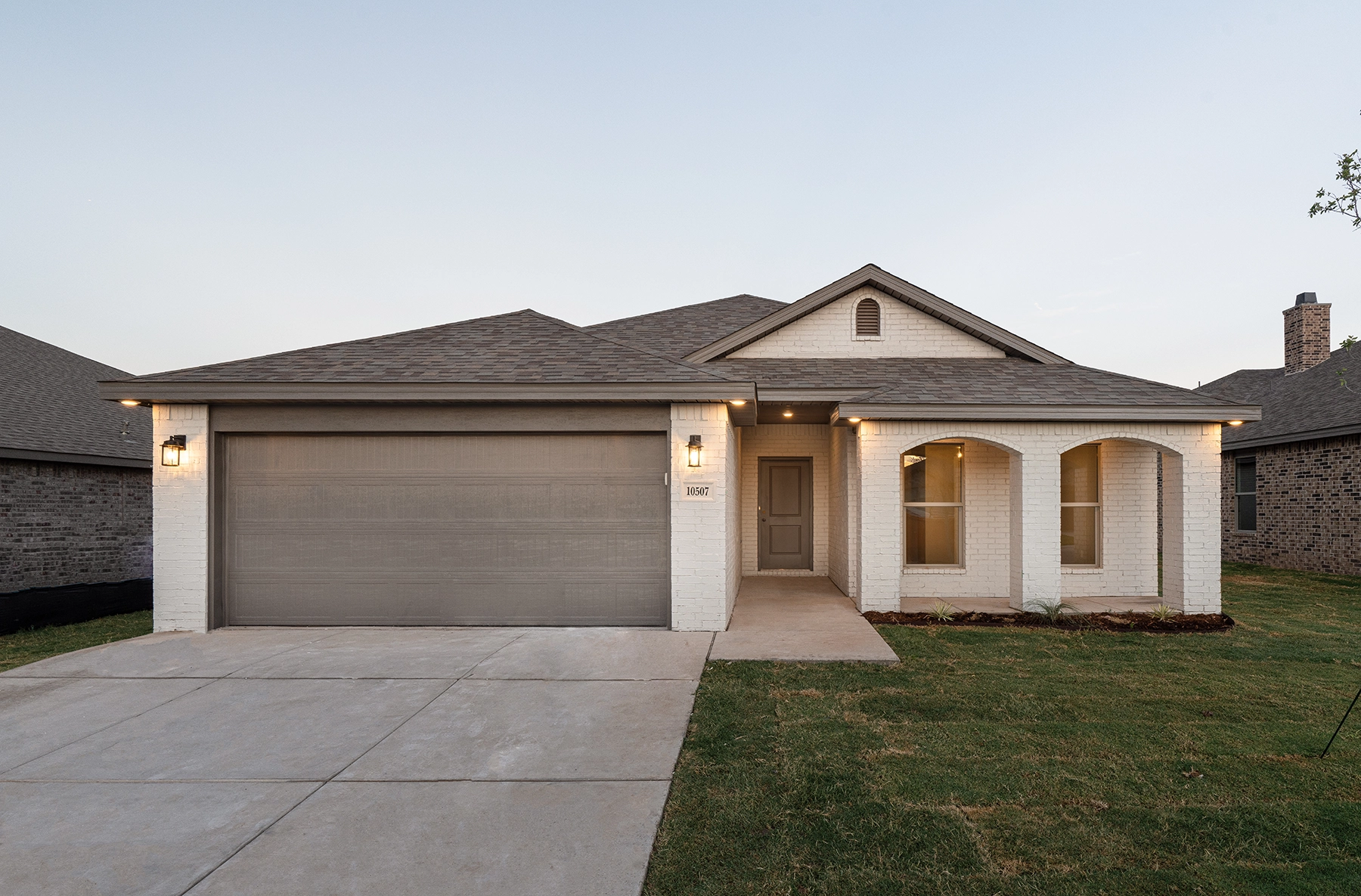 Exterior of a large Betenbough Home under Lubbock Sunset