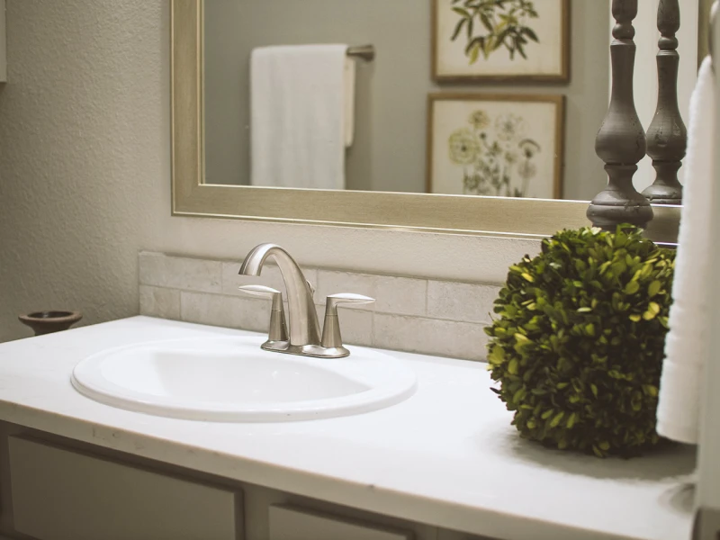 Photo of a Betenbough bathroom with a quartz countertop.