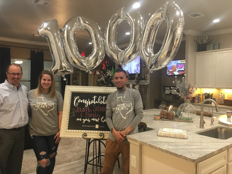 Photo of Journi and Salvador in Amarillo, our 1,000th homeowners for the year!