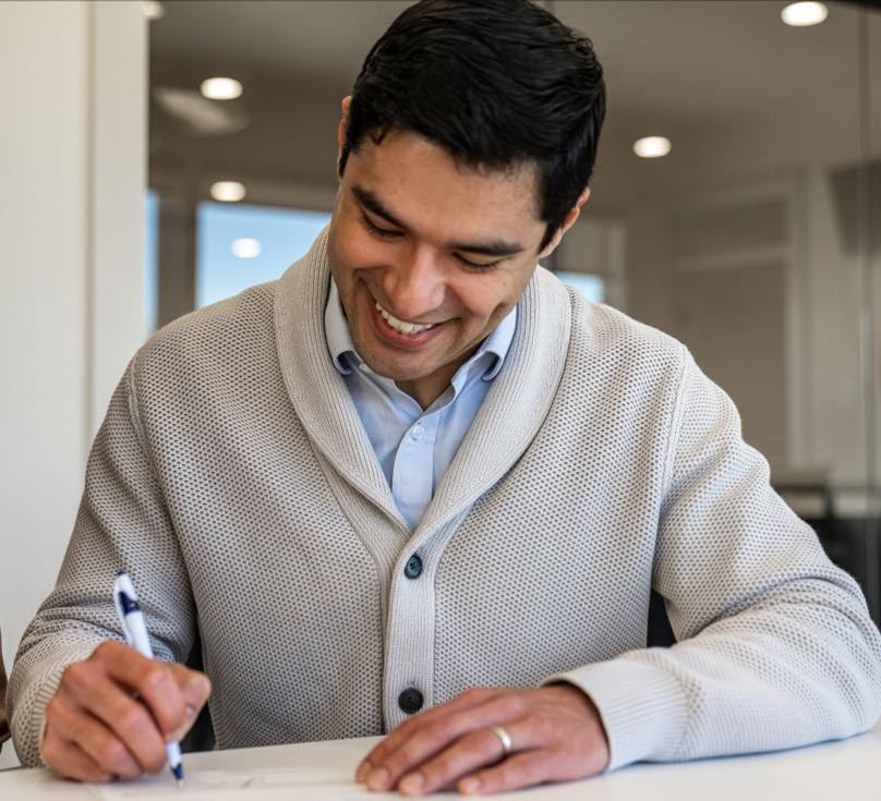 A Betenbough Homes home buyer navigates closing with ease, and some pay as little as $0 at closing!
